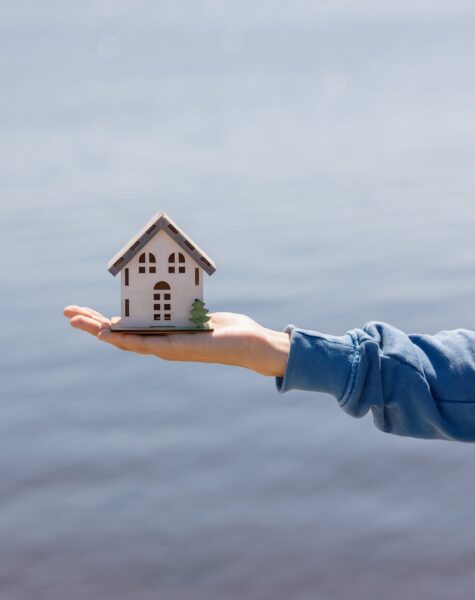 buying-or-selling-real-estate-woman-holding-a-min-2025-02-22-07-58-55-utc buying-or-selling-real-estate-woman-holding-a-min-2025-02-22-07-58-55-utc