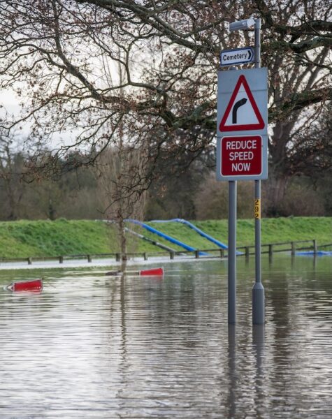 Yorkshire Flooding - England Flood water flowing down the street after the River Derwent burst it's banks in the village of Old Malton in North Yorkshire in northeast England. 27th November 2012.